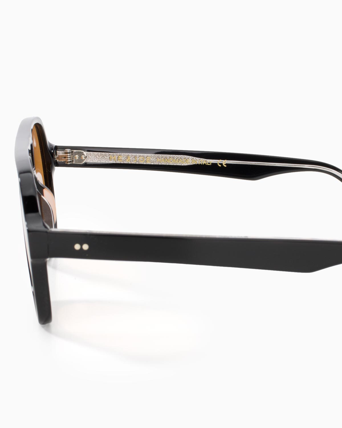 ME & JOE Atlas Black sunglasses with orange lenses – frame and logo detail