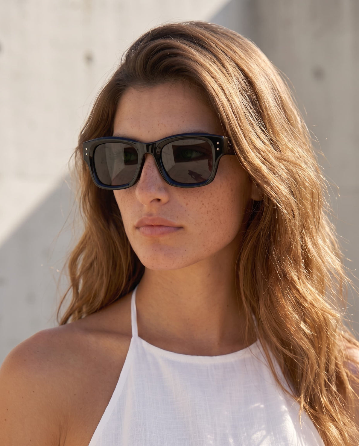 Nolan Black sunglasses by ME & JOE worn on female