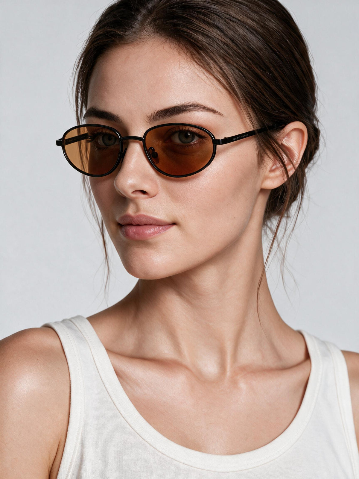 Noma Black sunglasses with sunset lenses by ME & JOE worn on female model