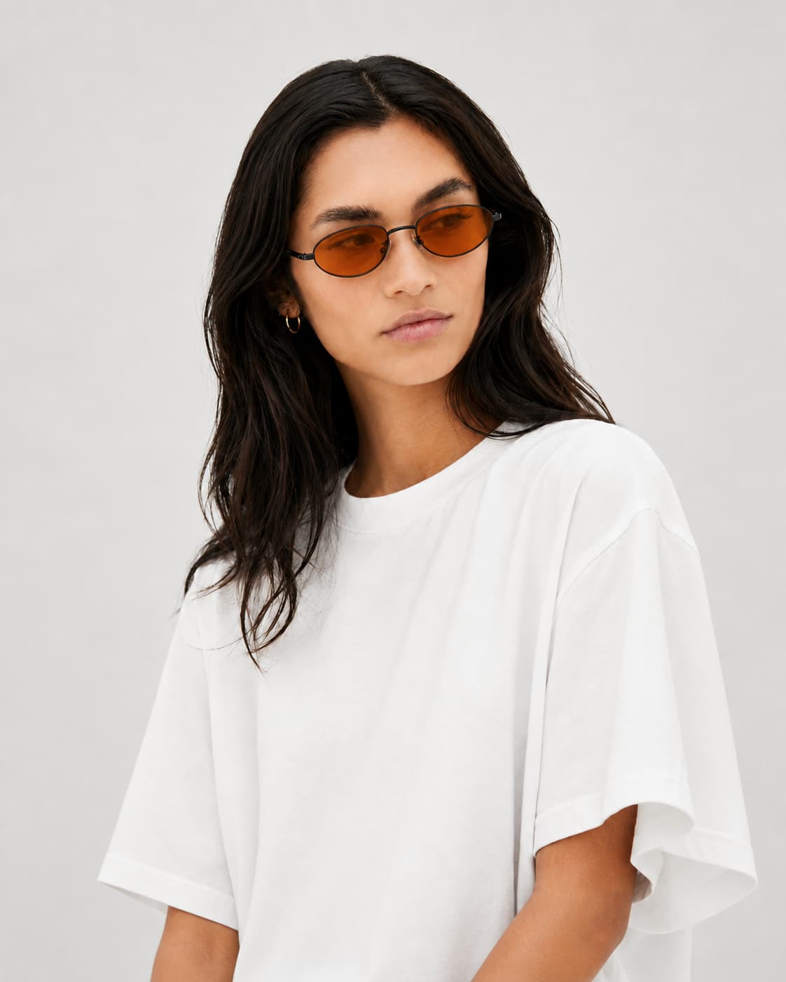 Noma Black sunglasses with sunset lenses by ME & JOE worn on female model
