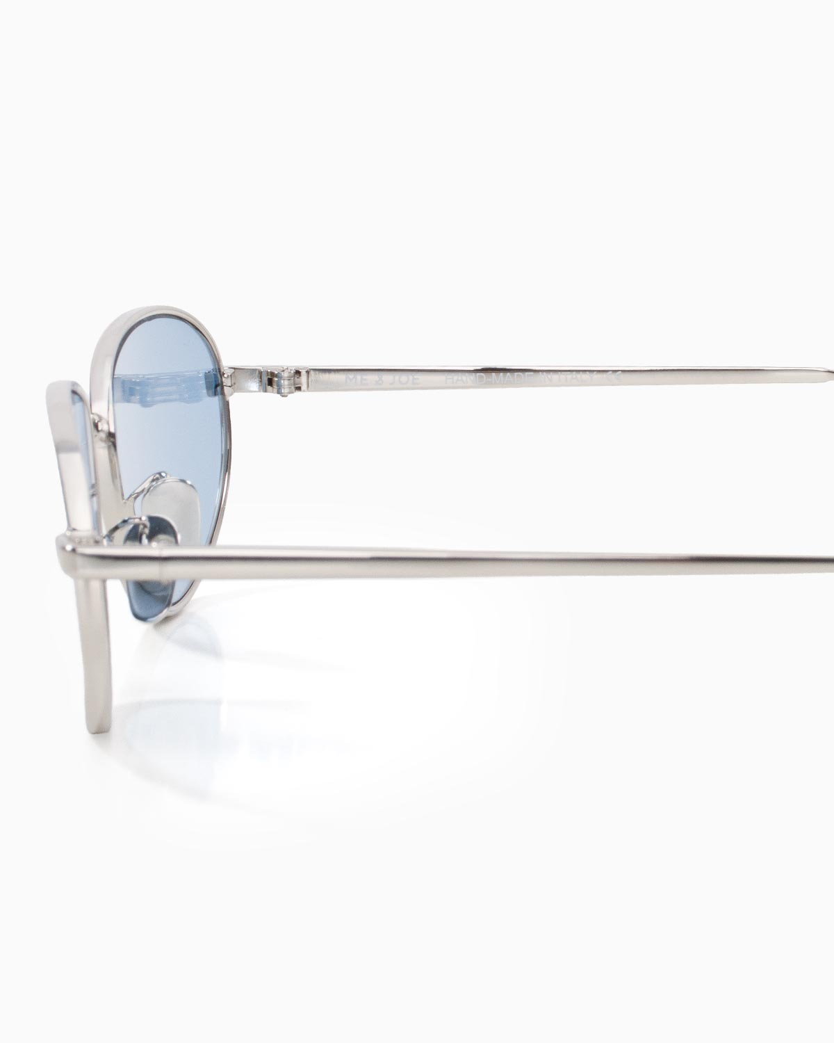 ME & JOE Noma silver sunglasses with blue lenses – temple and logo detail
