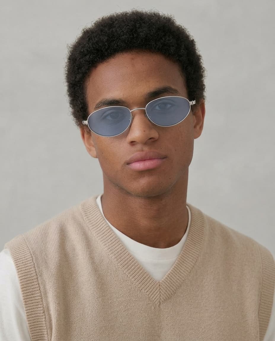 Noma Silver sunglasses with light Blue lenses by ME & JOE worn on male model
