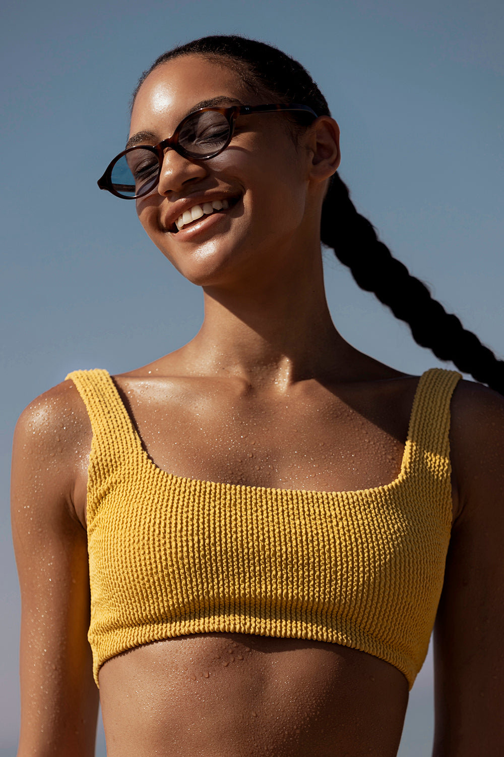 Woman wearing ME & JOE Alto tortoise sunglasses – three-quarter view