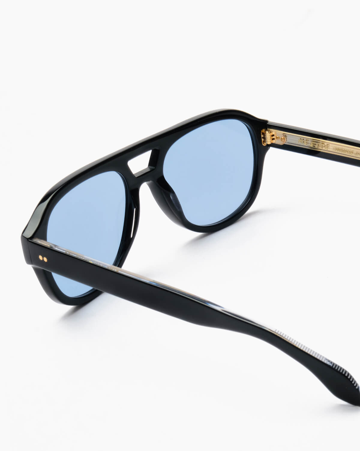 ME & JOE Ezra black sunglasses – angled view blue lenses
