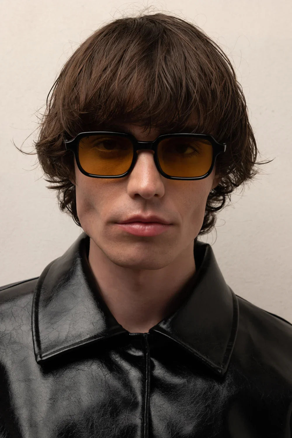 #color black yellow lenses. featured man