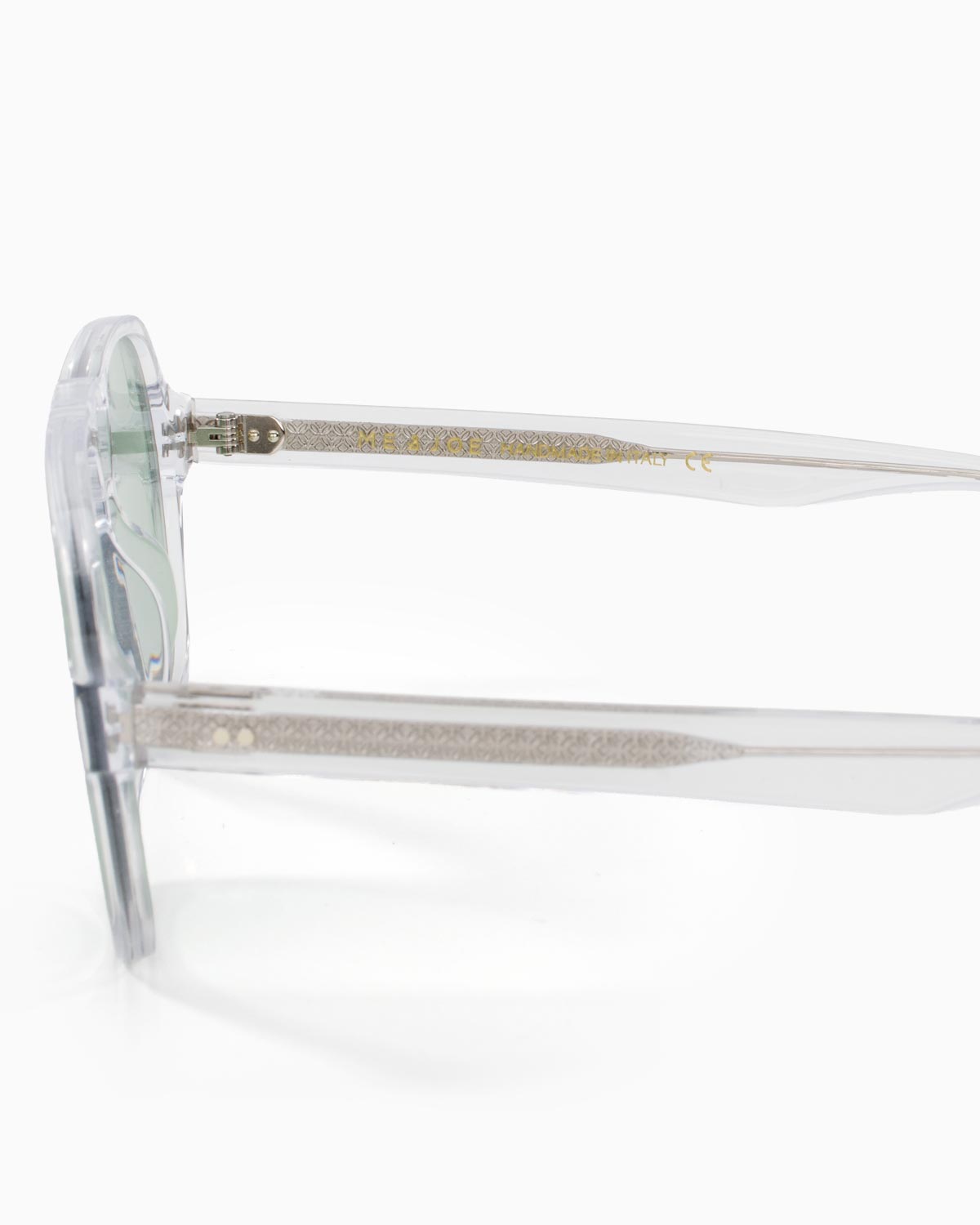 ME & JOE Atlas Clear sunglasses with light green lenses – frame and logo detail