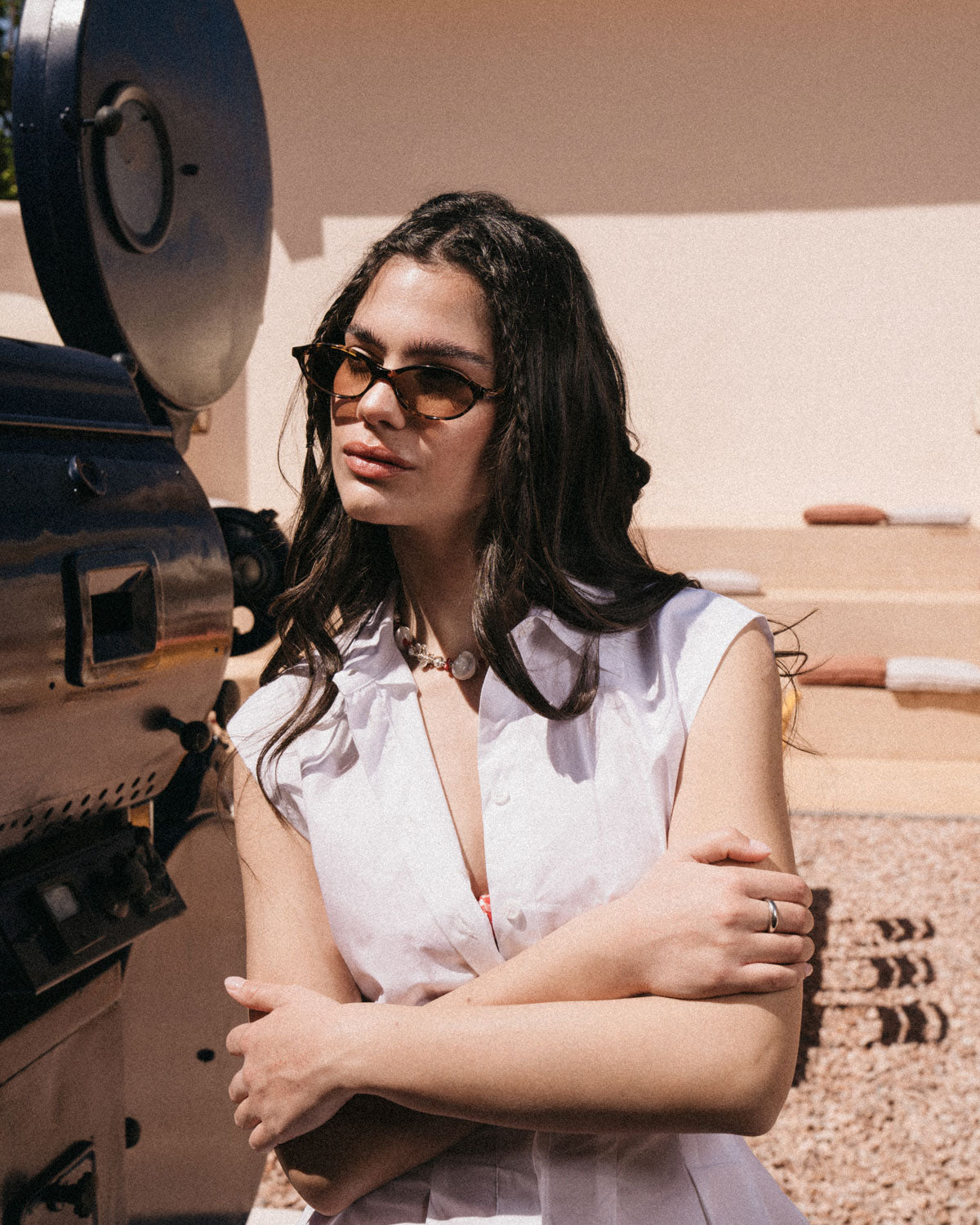 Woman wearing ME & JOE Ines tortoise sunglasses with amber lenses – lifestyle view