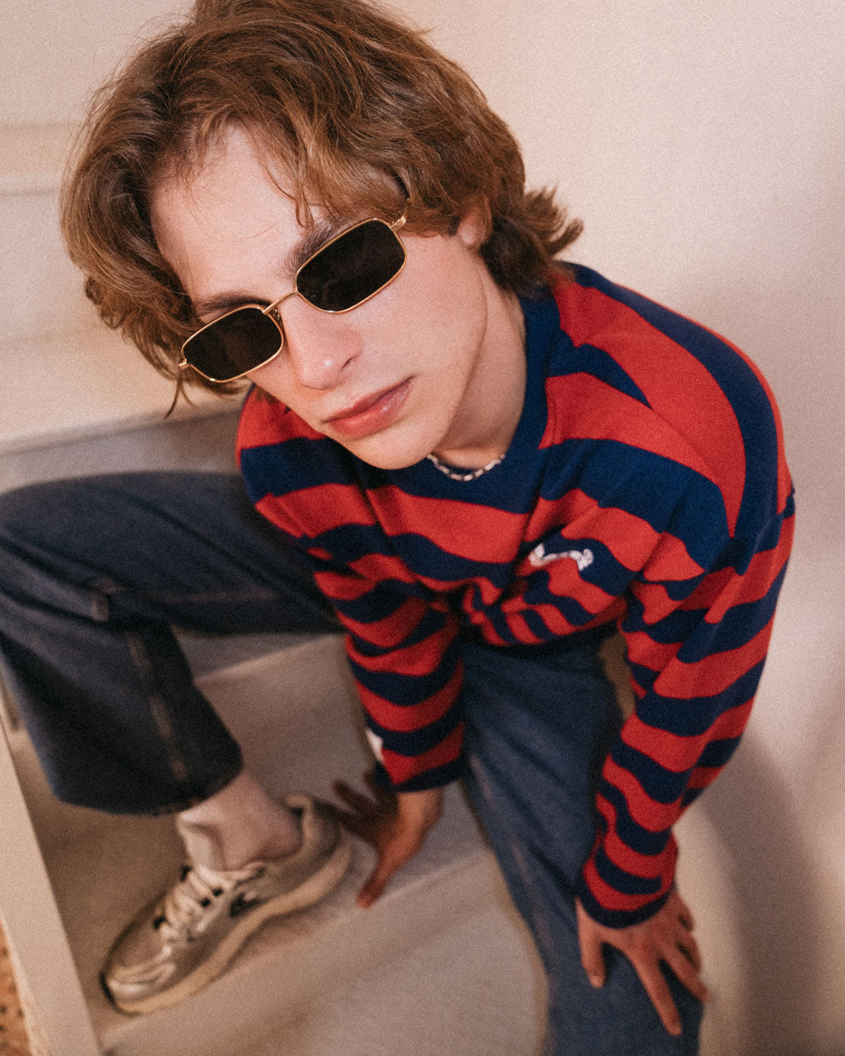 Man wearing ME & JOE Luka gold sunglasses – lifestyle view