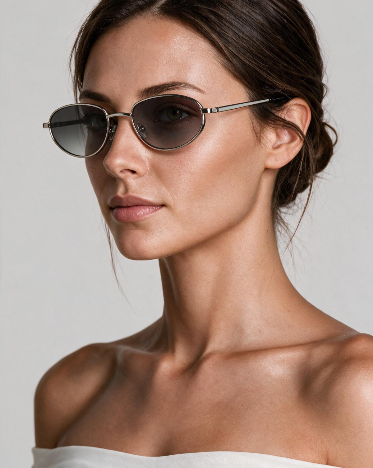 Noma Silver sunglasses with Gradient Grey lenses by ME & JOE worn on female model
