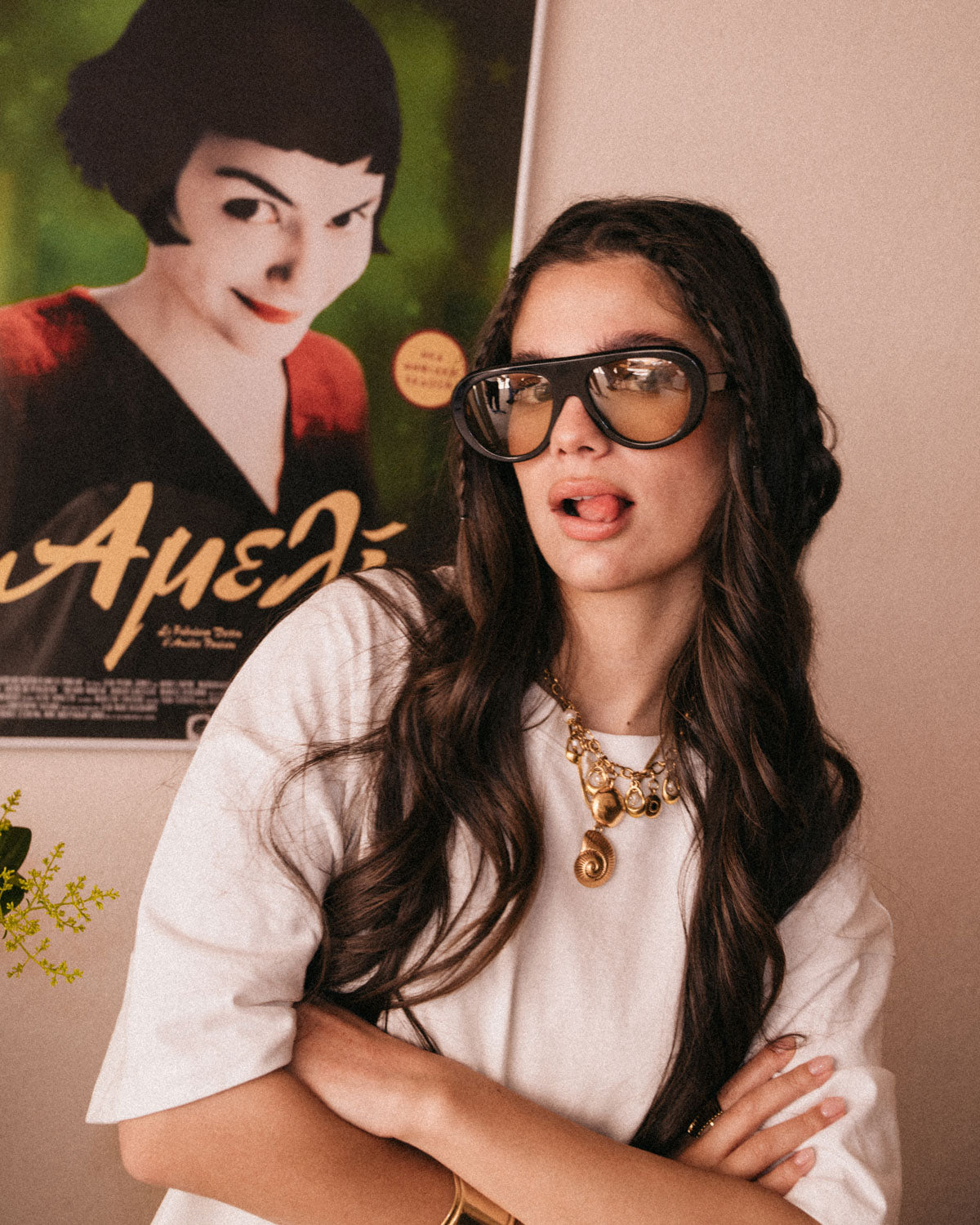 Woman wearing ME & JOE Riviera black sunglasses with amber lenses –lifestyle view