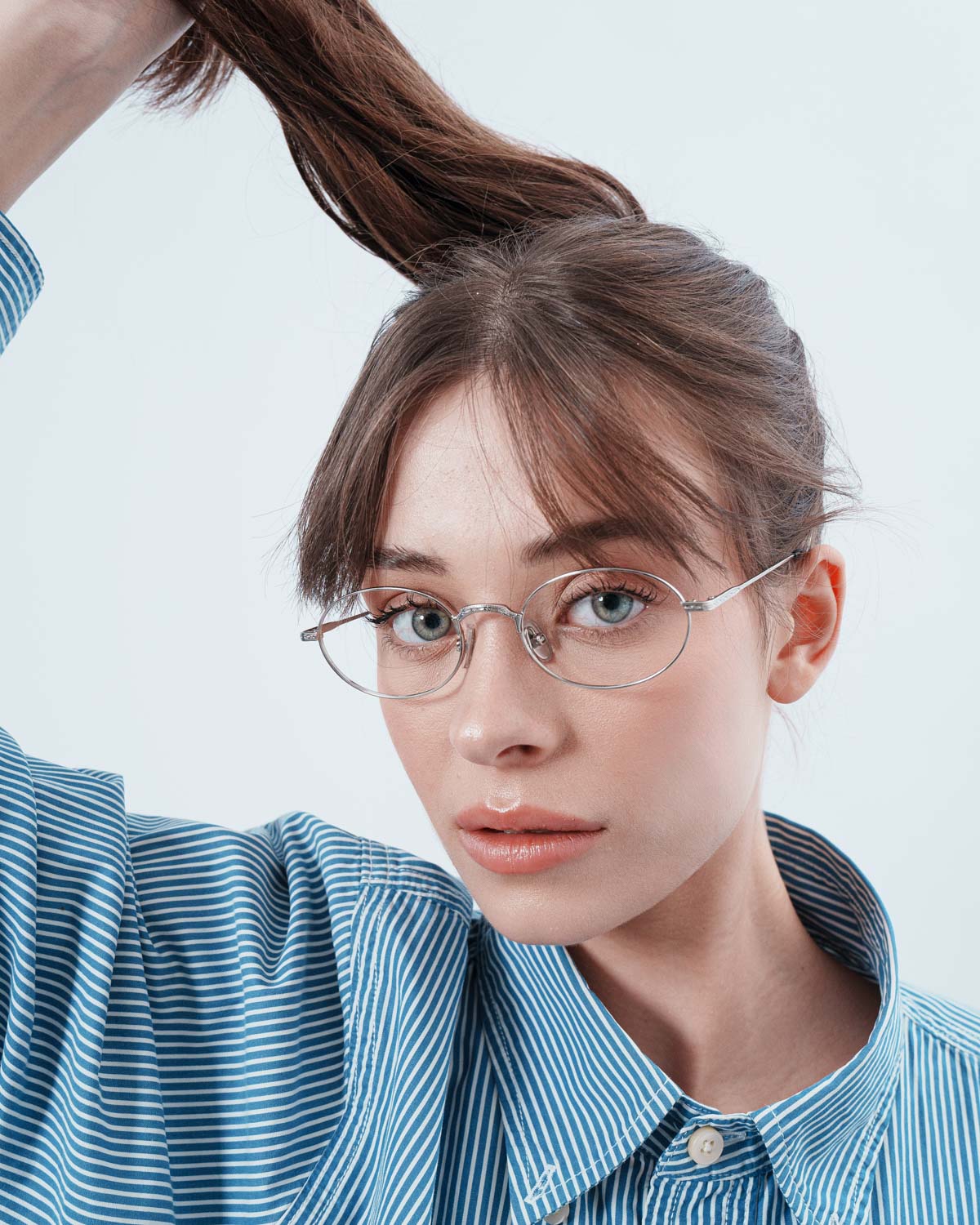 Woman wearing ME & JOE Soma silver optical glasses – front view