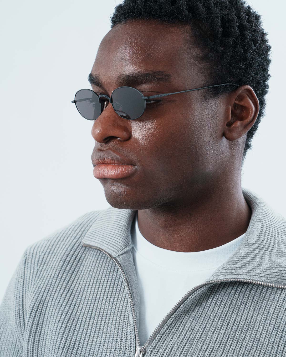 Man wearing ME & JOE Soma black sunglasses – three-quarter view