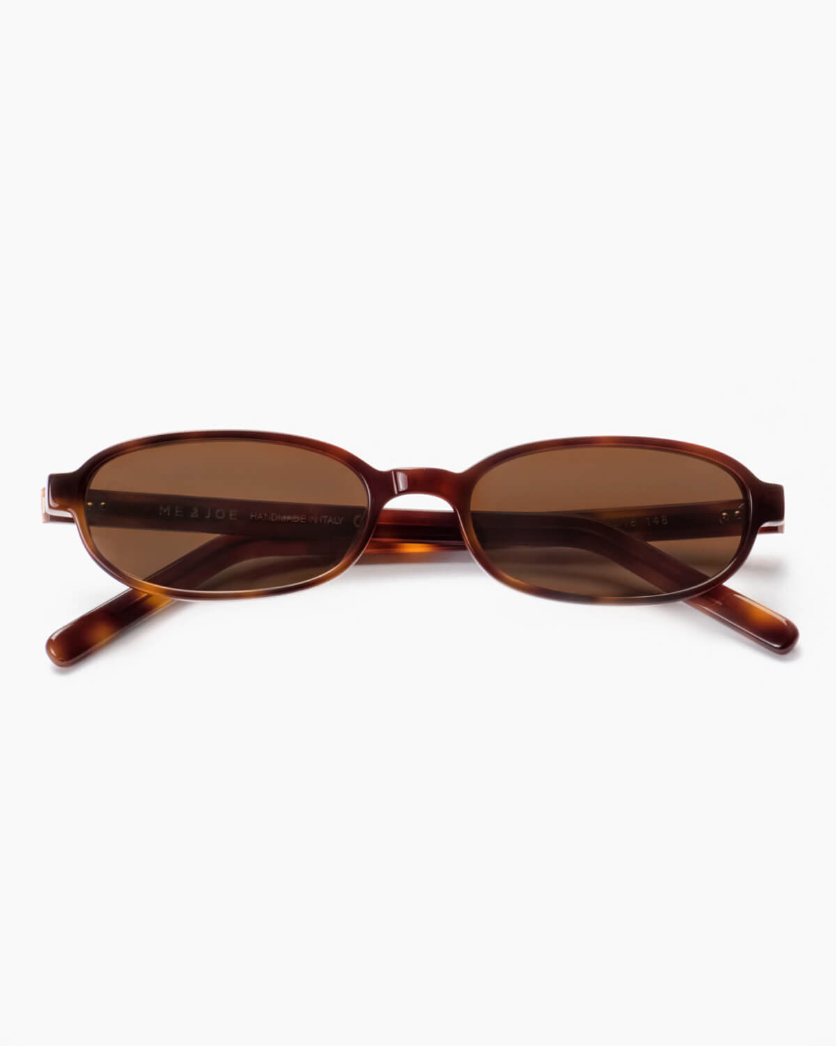 ME & JOE Iris sunglasses in tortoise – front view on white background, Tortoise frame, Brown lenses
	