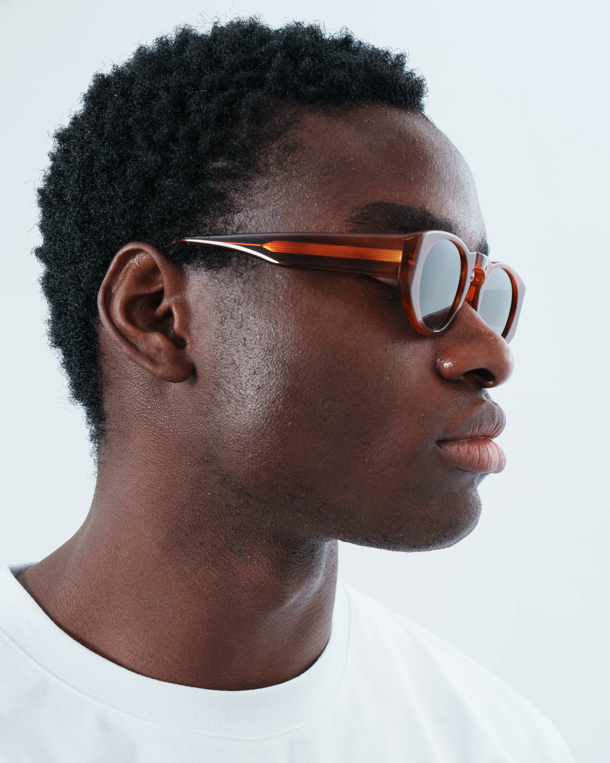 Man wearing ME & JOE Onassis tortoise sunglasses – side view