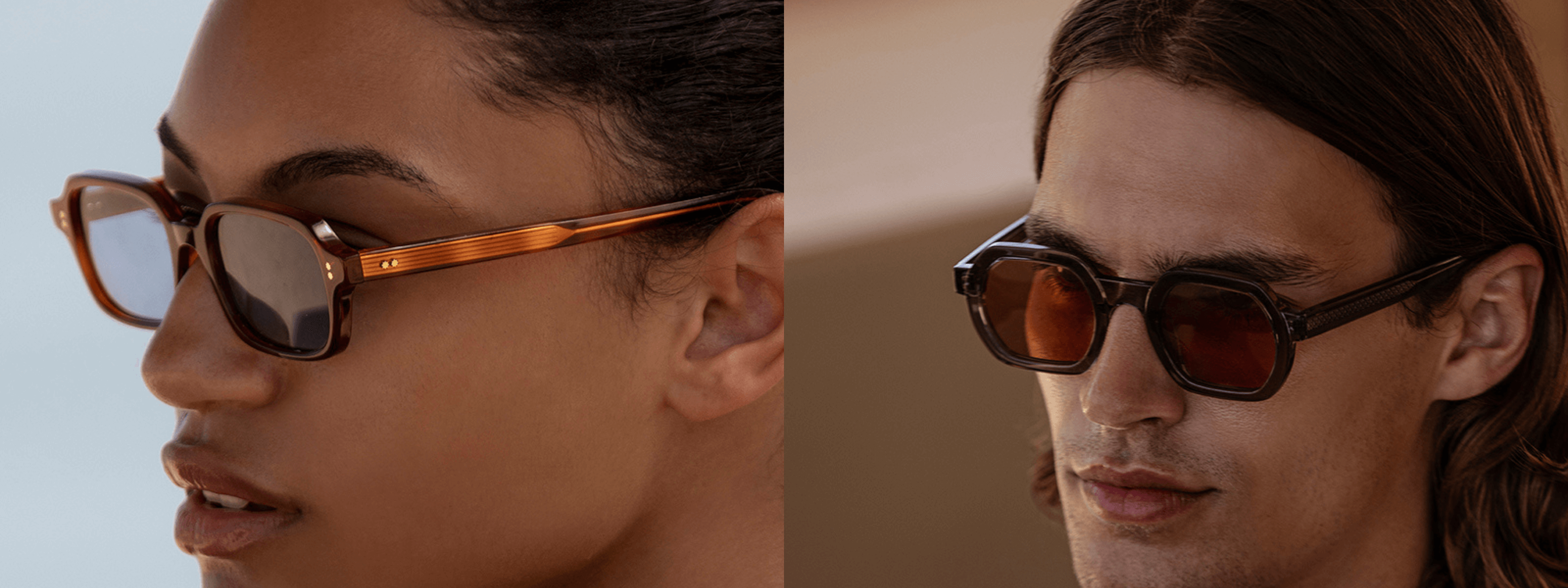 Two people wearing sunglasses with a blurred background